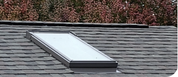 Skylight on a Moire Black Roof | Summit Roofing