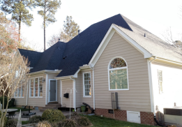 Apex rear of house with Moire Black Roof | Summit Roofing