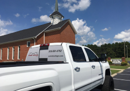 Middlesex Baptist Church with Summit Roofing Truck parked in lot | Summit Roofing
