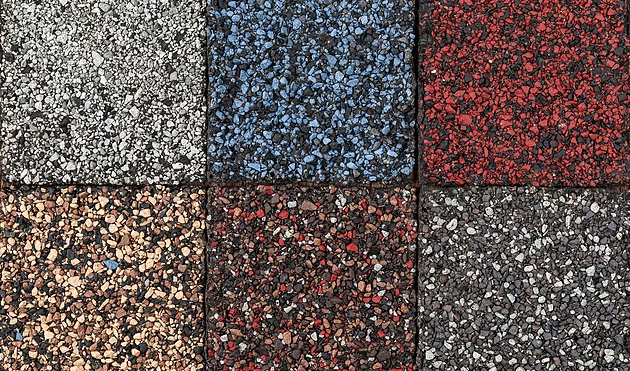 Close up of asphalt roof tile colors in grey, blue, red, mixed tan, asphalt, and mixed brown | Summit roofing